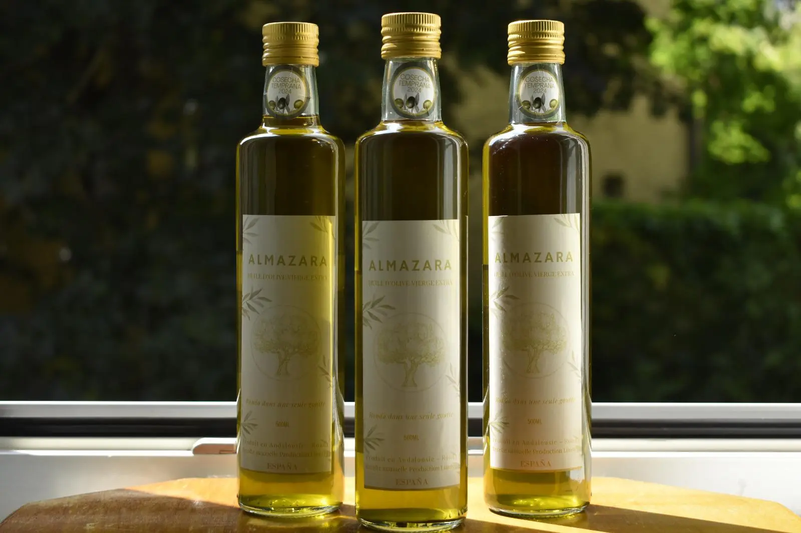 Tres botellas de aceite ALMAZARA